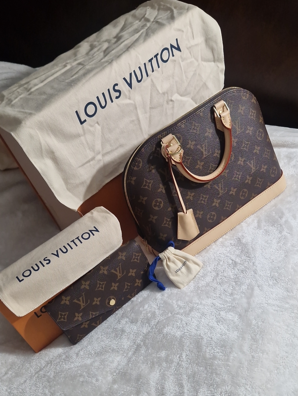 Louis Vuitton Monogram Alma BB Handbag in Brown